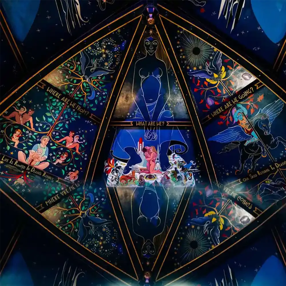 Vibrant painting covering the vaults of a curved church ceiling. Background shades of dark blue are covered with gold, brilliant coloured people, fantastical animals and a large central seated woman with naked breasts.