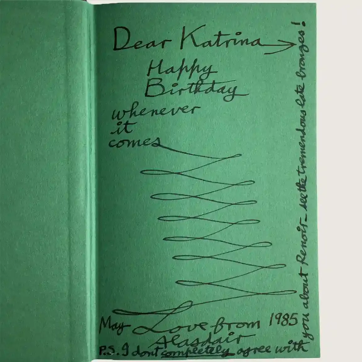 Inscription in ink on a green endpaper: 'Dear Katrina, Happy Birthday whenever it comes', a zigzag flourish, 'Love from Alasdair, May 1985', and a postscript up the margin about Renoir.