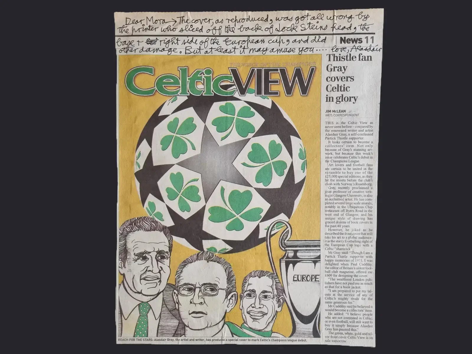 A newspaper cutting showing Alasdair's Celtic View cover, a shamrock-patterned football above three drawn figures and a trophy. Handwriting fills the space above the cutting.