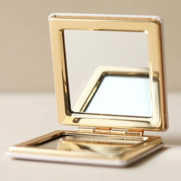 metallic-live-by-the-sun-compact-mirror-4x3a0667-620x620.jpeg