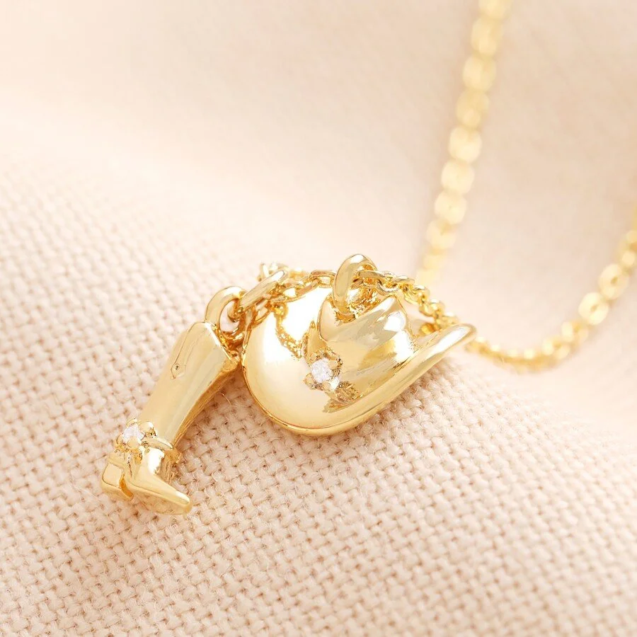 cowboy-boot-hat-gold-necklace-4x3a4868-copy2-900x900.jpeg