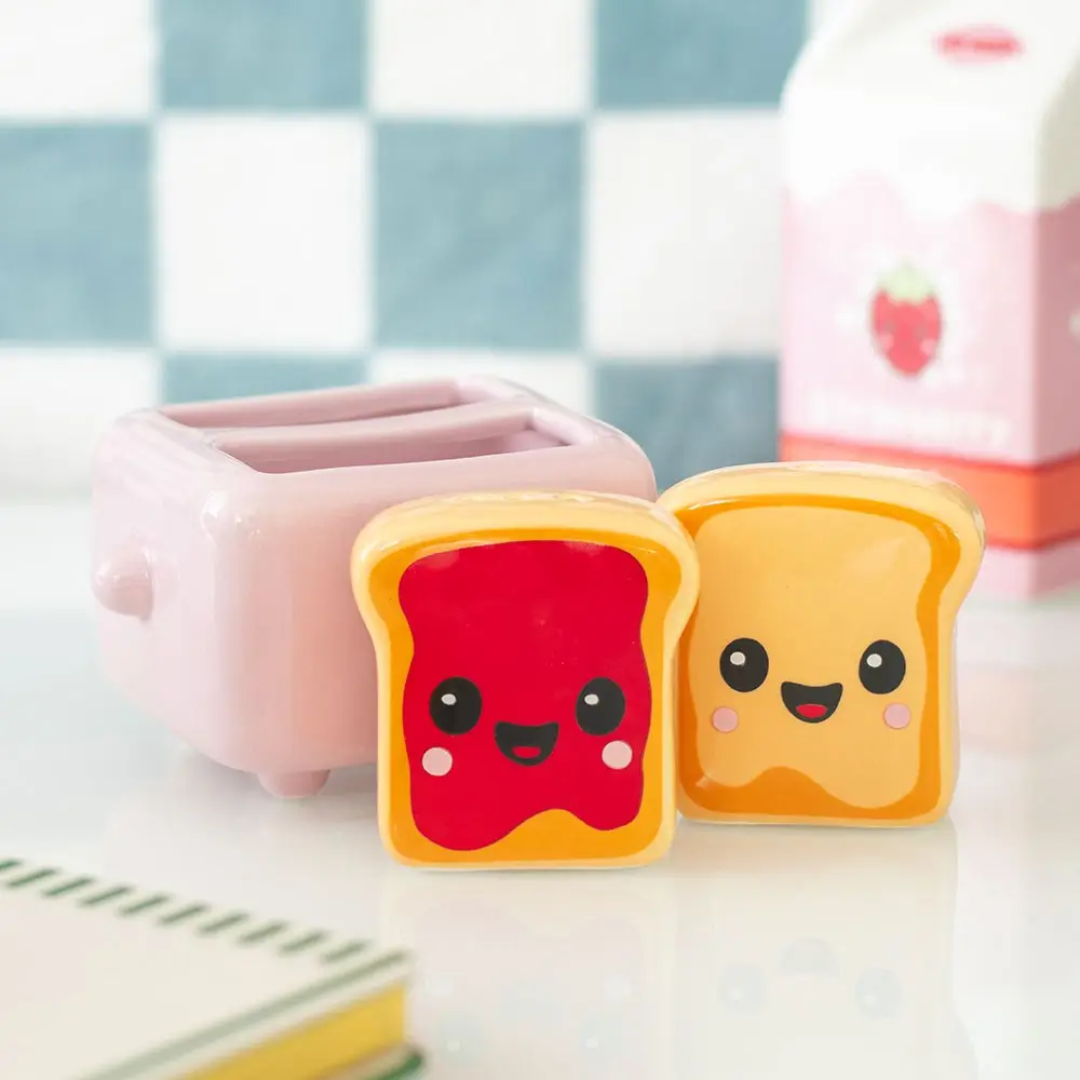 Kawaii Toast Salt and Pepper Shakers in Toaster Holder.png