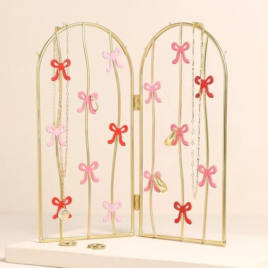 pink-red-bow-folding-metal-jewellery-stand-gold-80282-4x3a4022-copy-550x550.jpeg