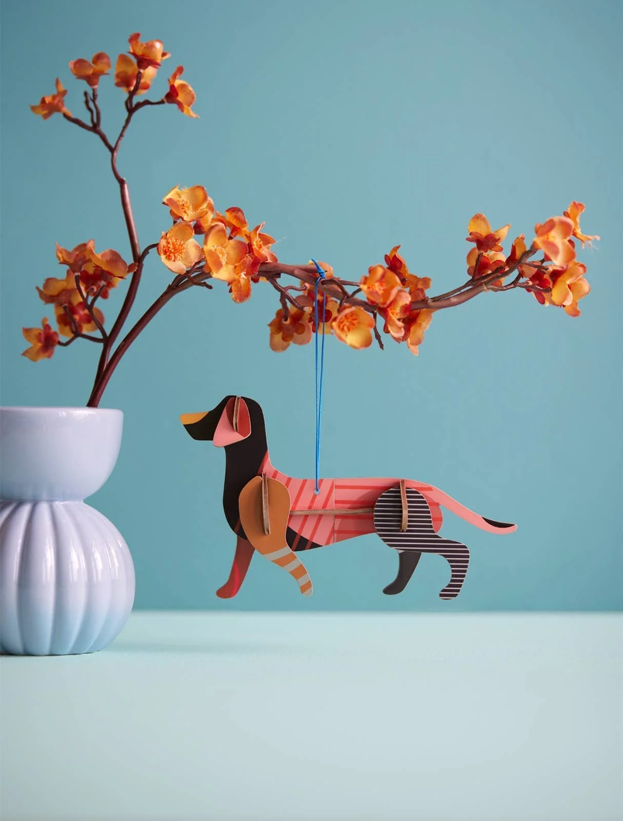 studio-roof-ornament-lucky-charm-dachshund.jpg