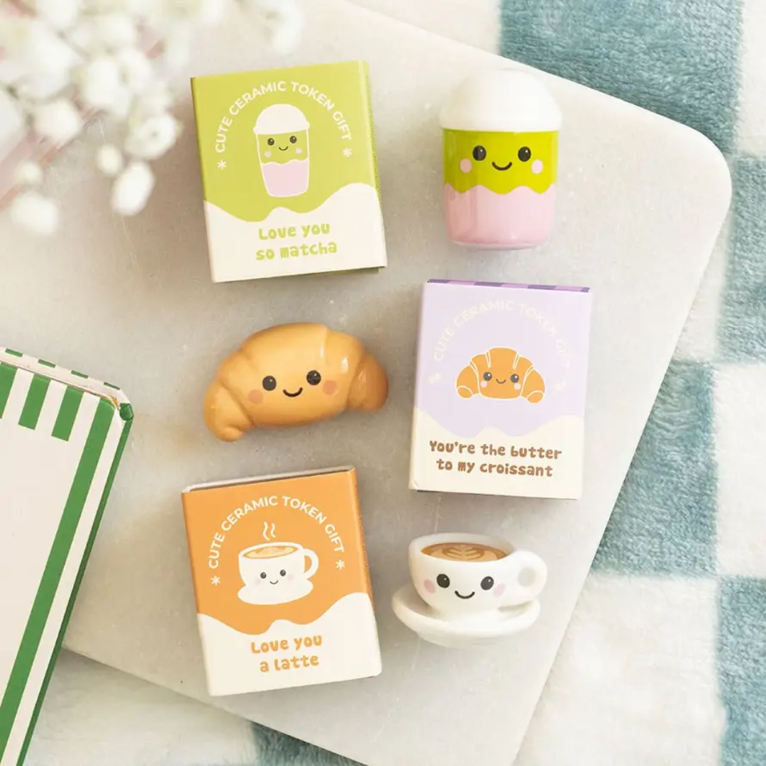 Set of 24 Kawaii Kafe Ceramic Cafe Token Gifts in Display.png
