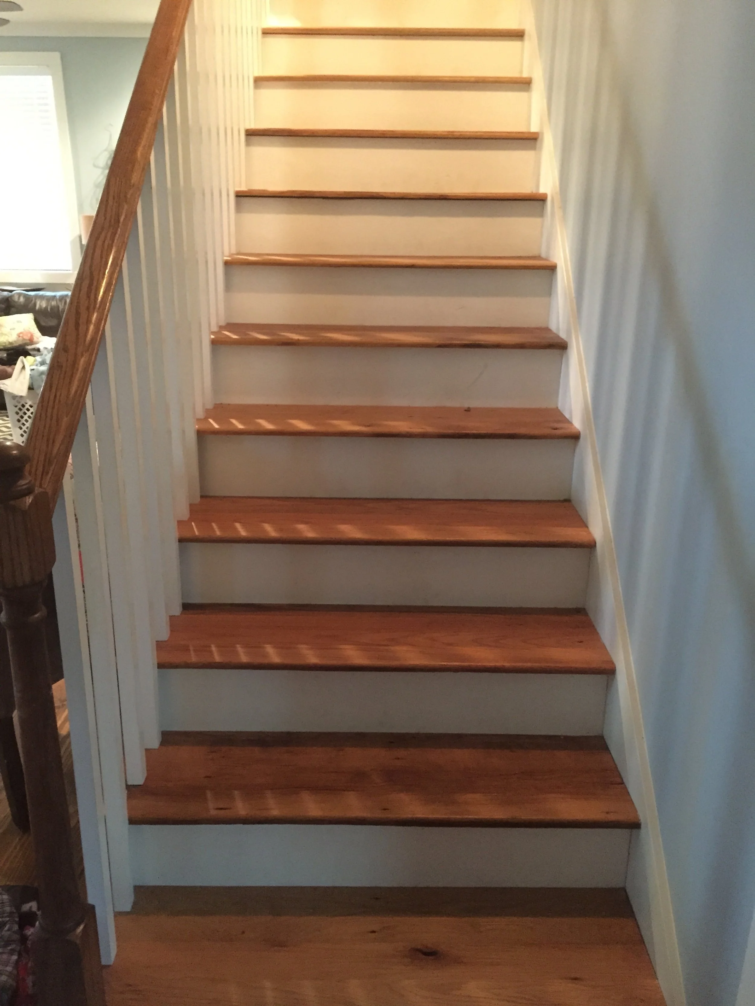 Custom stair treads from reclaimed barn wood