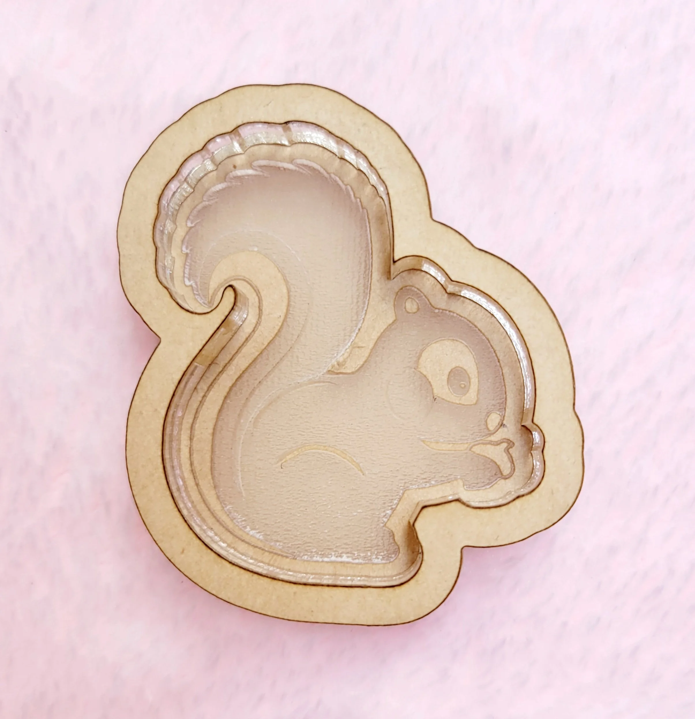 Squirrel Holding Acorn Shaker