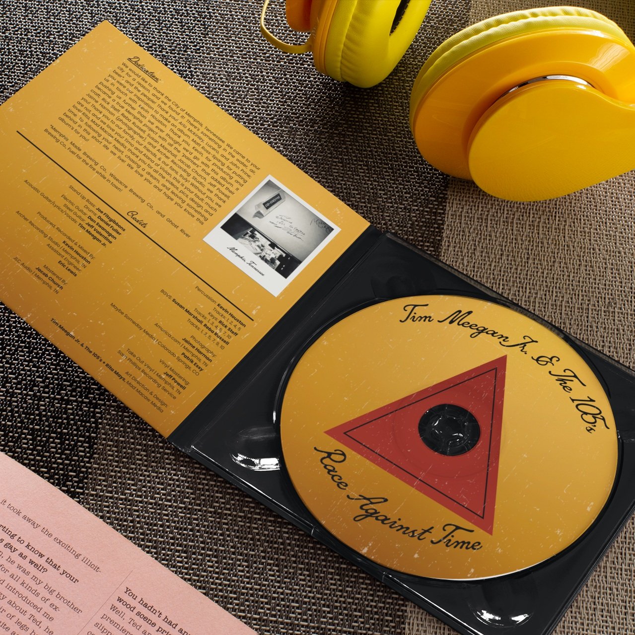 digipak-mockup-with-a-cd-and-headphones-28350.jpg