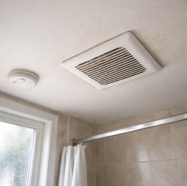 fogged bathroom mirror with dripping walls under vent fan