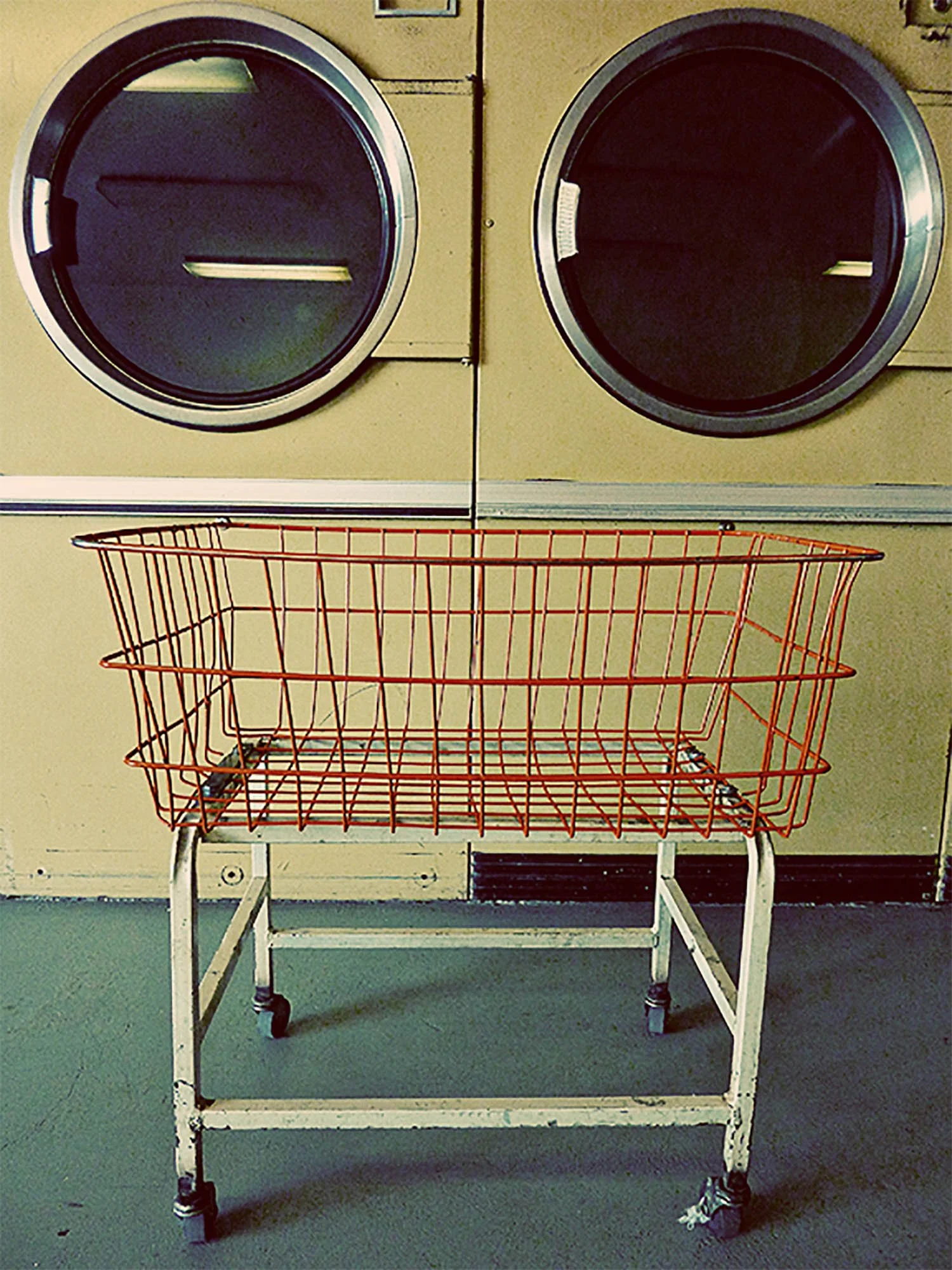 Laundromat in Wall South Dakota. Looks like a robot with 2 dryer eyes and a basket below for a mouth. 