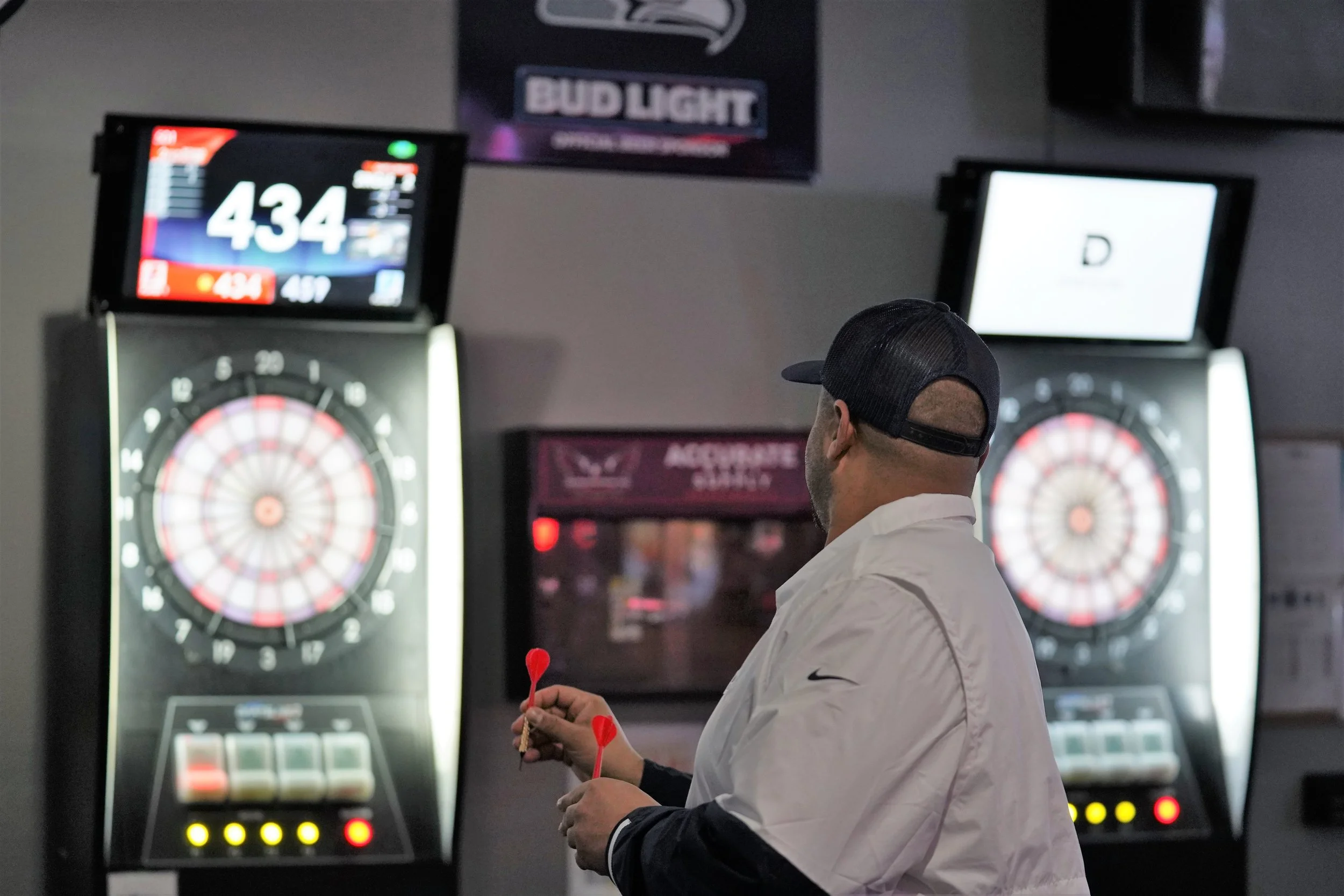 Dart players Action Sports Bar has plenty of room for both