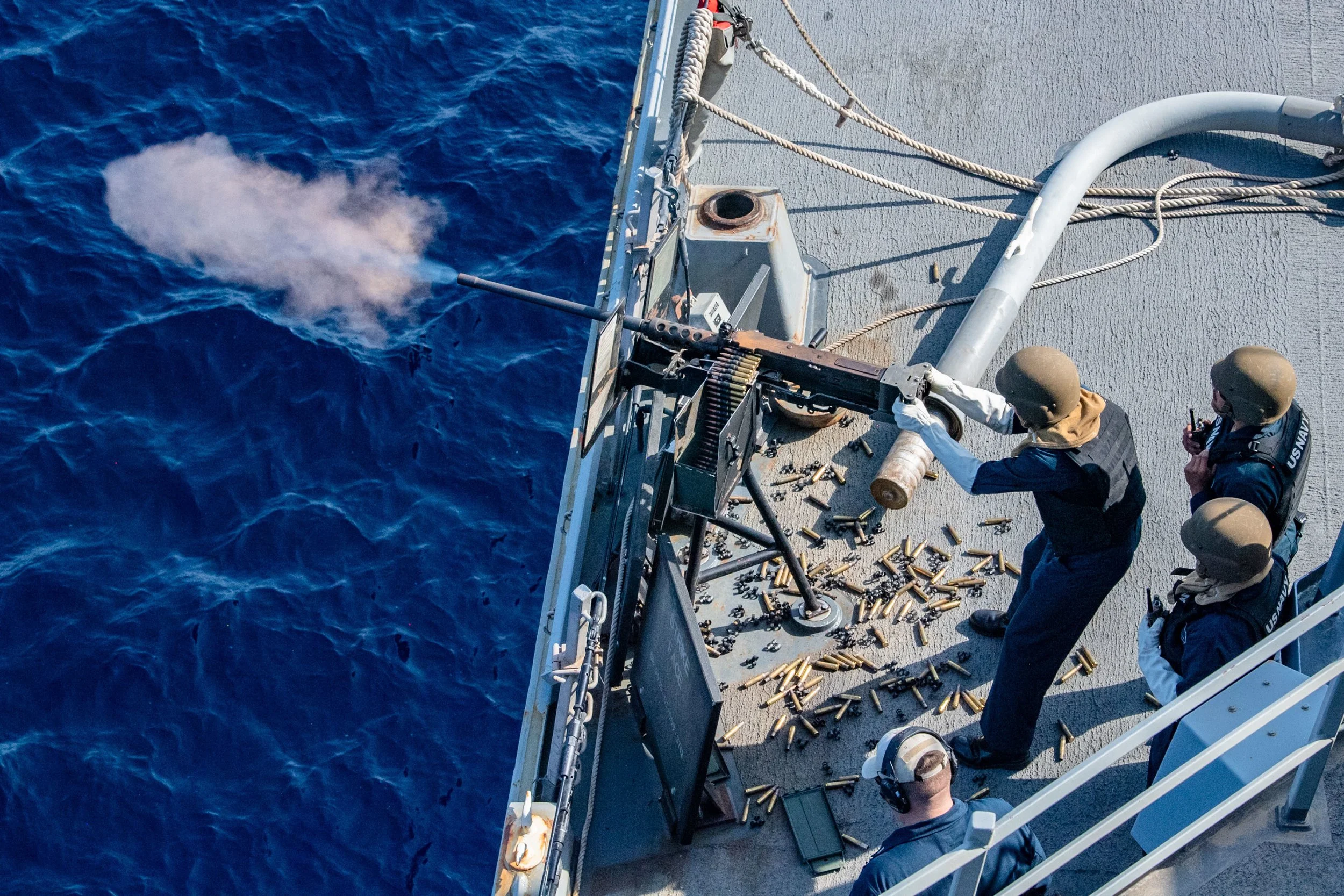   RED SEA (Oct. 25, 2021) Sailors aboard guided-missile destroyer USS O’Kane (DDG 77) fire a .50 caliber machine gun during a live-fire exercise as part of joint exercise Indigo Defender, Oct. 25. Indigo Defender 21 is a capstone bilateral maritime e
