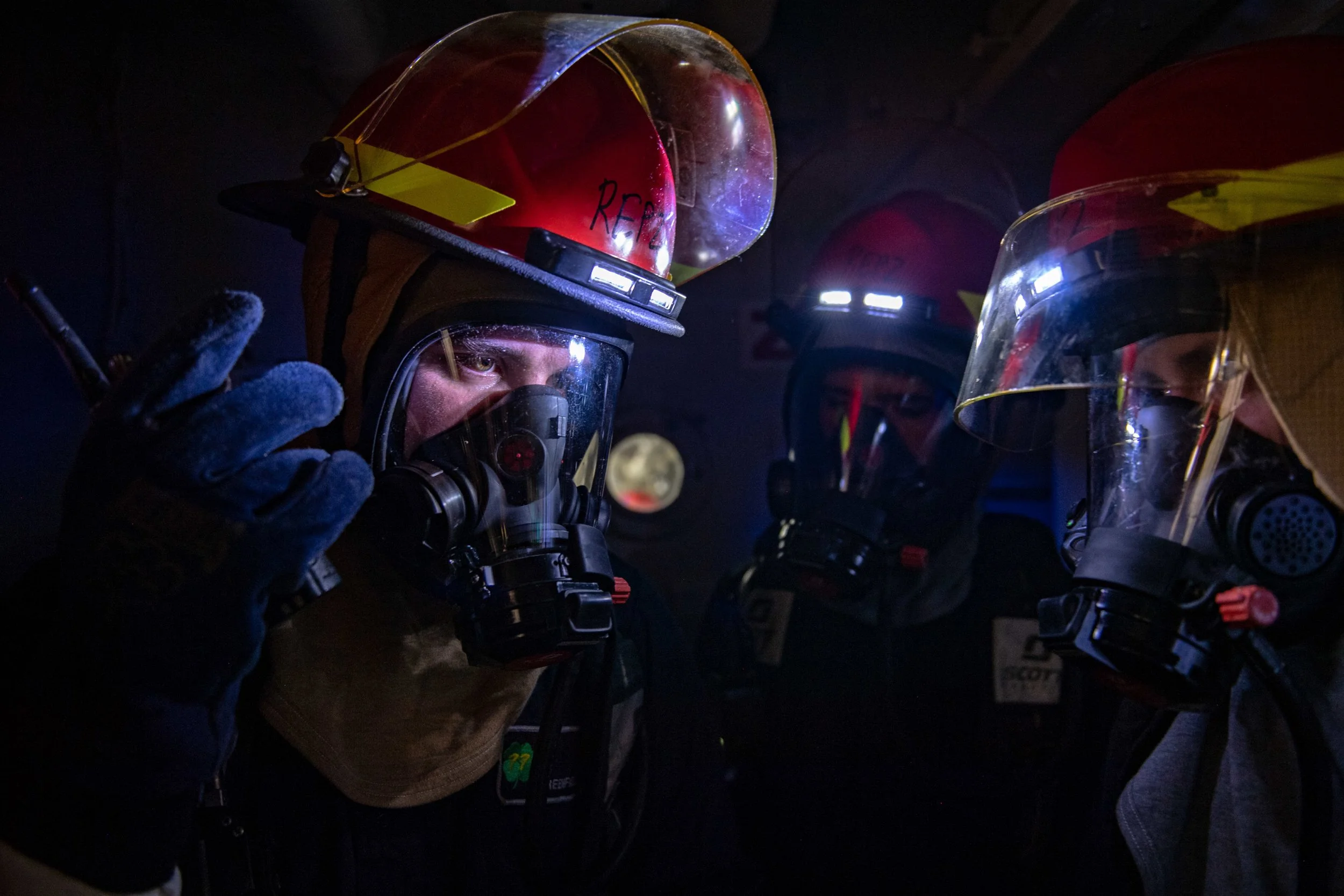   (Sept. 26, 2021) Sailors aboard guided-missile destroyer USS O’Kane (DDG 77) respond to a simulated fire during a damage control drill in the Arabian Sea, Sept. 26. (U.S. Navy photo by Mass Communication Specialist Seaman Elisha Smith) 