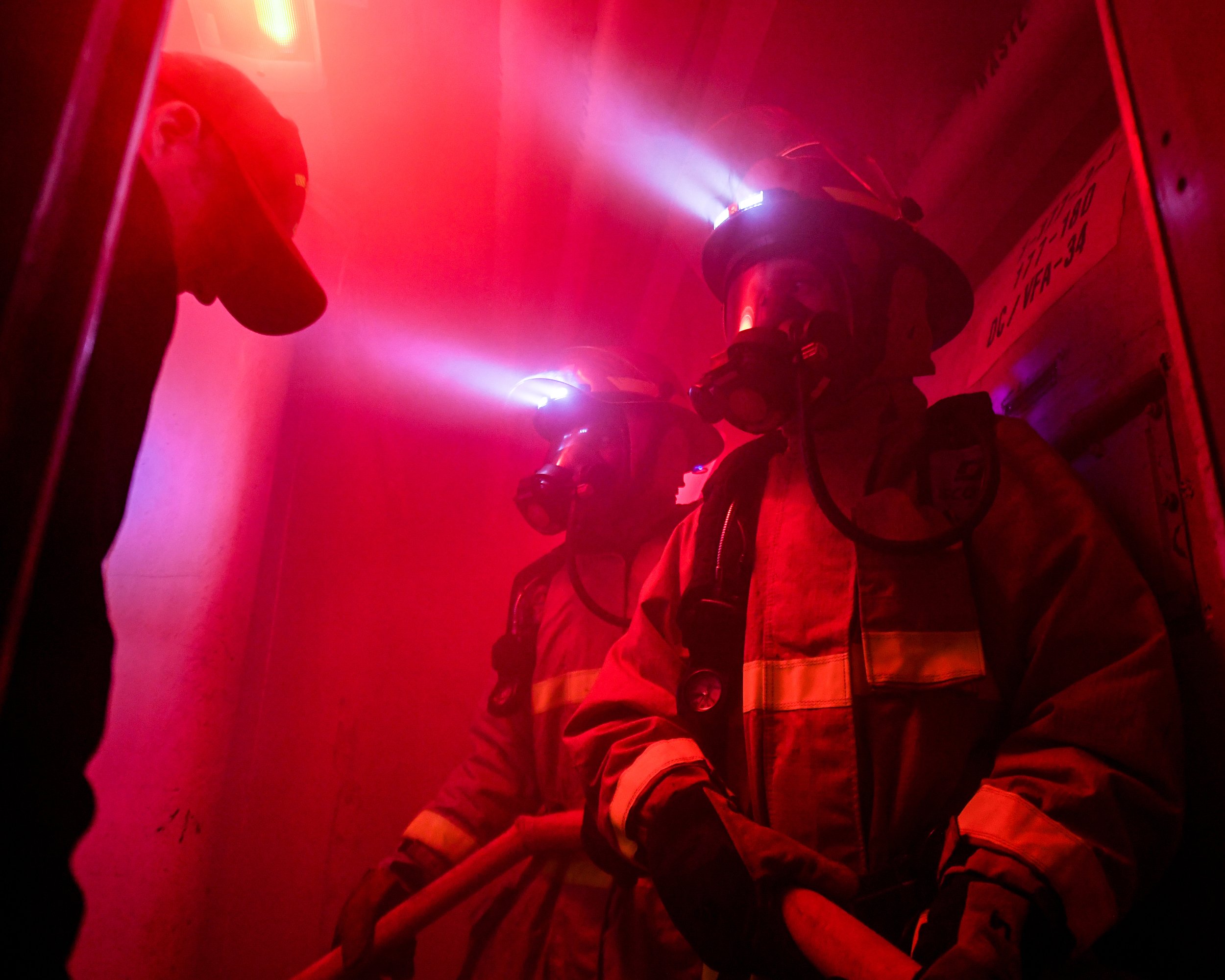  PACIFIC OCEAN (July 15, 2021) Sailors simulate firefighting techniques during a general quarters drill aboard Nimitz-class aircraft carrier USS Carl Vinson (CVN 70), July 15, 2021. (U.S. Navy photo by Mass Communication Specialist Seaman Elisha Smit