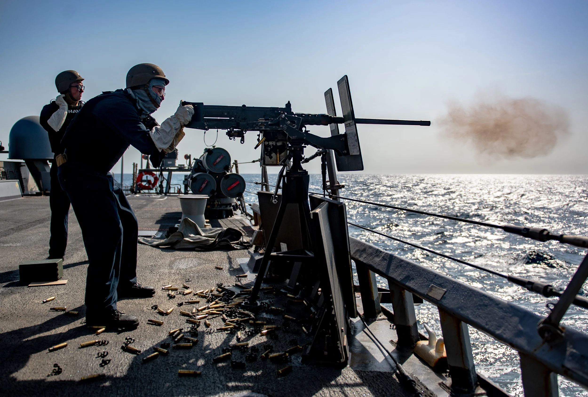  ARABIAN SEA (Sept. 9, 2021) Culinary Specialist 3rd Class Damon Moran fires a .50 caliber machine gun during a training drill aboard guided-missile destroyer USS O’Kane (DDG 77) in the Arabian Sea, Sept. 9. (U.S. Navy photo by Mass Communication Spe