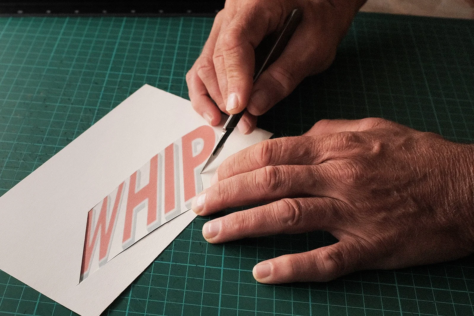 lettering-collage-cut-artist-hands.jpg