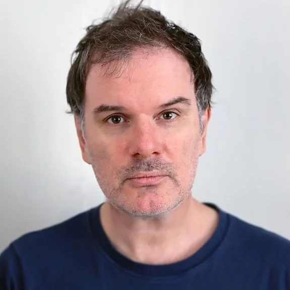 Solid blue background.