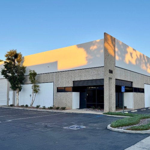 Front exterior of 531 W Rincon Street, a single-story industrial building in Corona, California