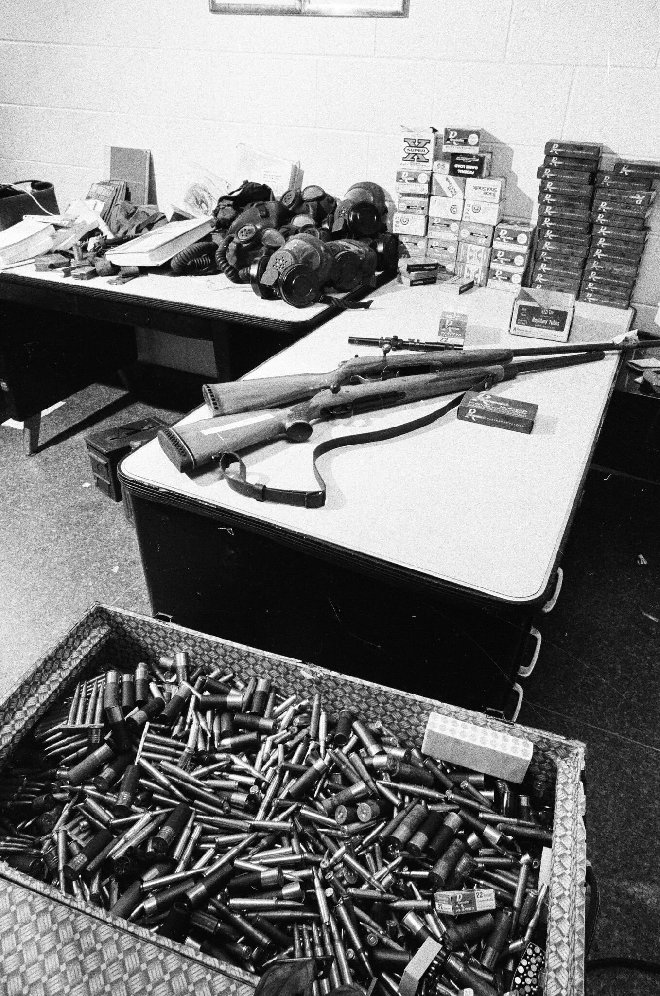 Guns and ammunition confiscated during a raid of the South Side headquarters. Photo: April 25, 1974, ST-19030977-0003, Chicago Sun-Times collection, Chicago History Museum