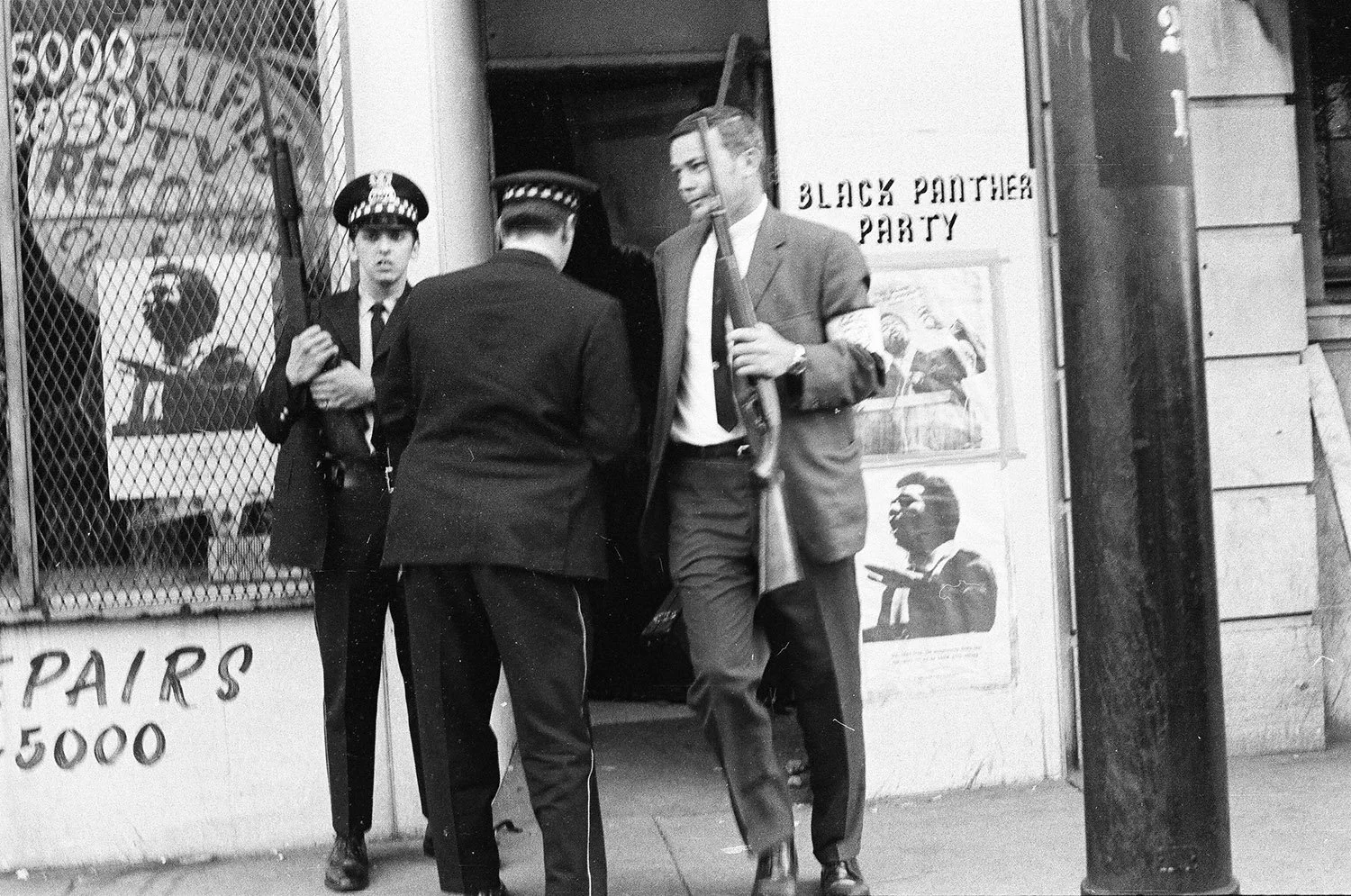 FBI Agents and Chicago Police officers raid headquarters on June 4, 1969, under the pretense of looking for a fugitive who was actually the informant, George Samms. Photographer Joe Marino, ST-19031007-0008, Chicago Sun-Times collection, Chicago Hist