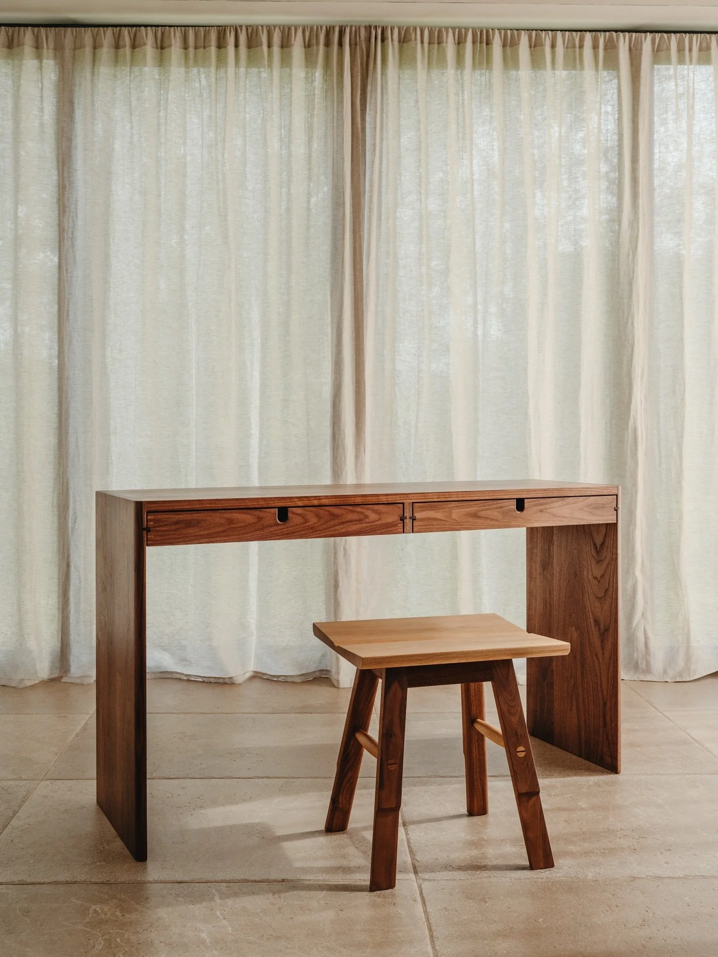 Introducing the Rowan Dressing Table - designed with softened edges, balanced proportions, and thoughtful details that bring a sense of calm to everyday routines. Crafted from solid oak, ash, or shown here in rich black walnut, Rowan celebrates the n