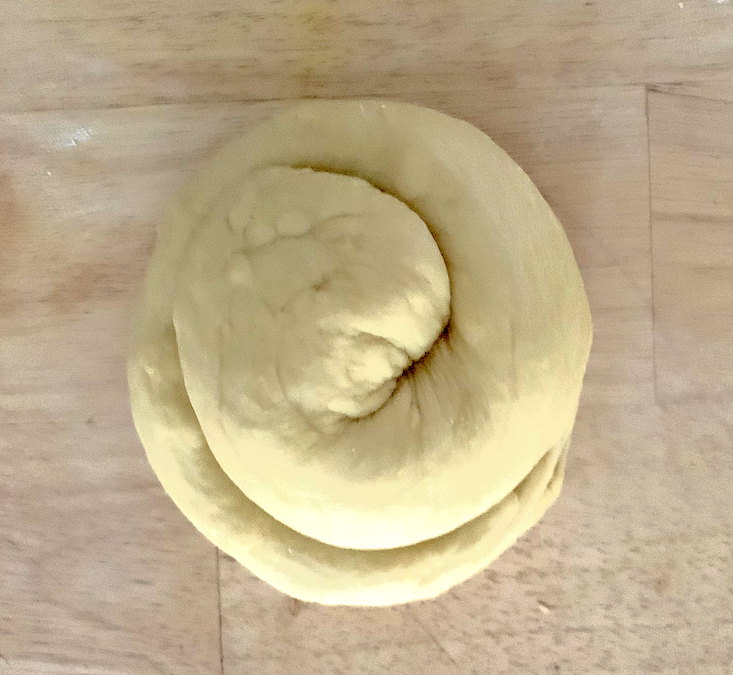 unbaked round turban challah bread