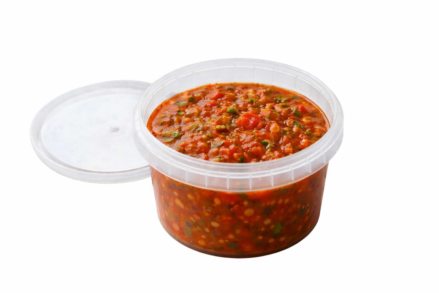 Salsa llajwa fresca en contenedor transparente.png