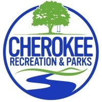Cherokee Recreation & Parks logo with a green tree, blue circle, and stylized river and grass