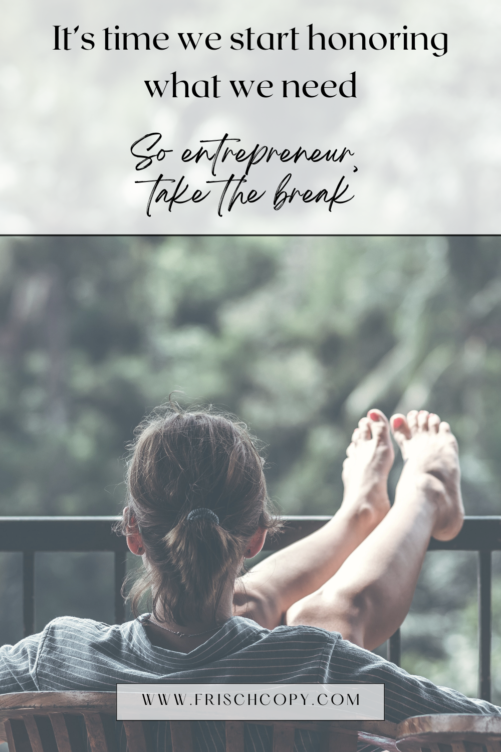 A woman is sitting on a chair outside, her feet resting on the railing in front of her. There is a table next to her with a drink.