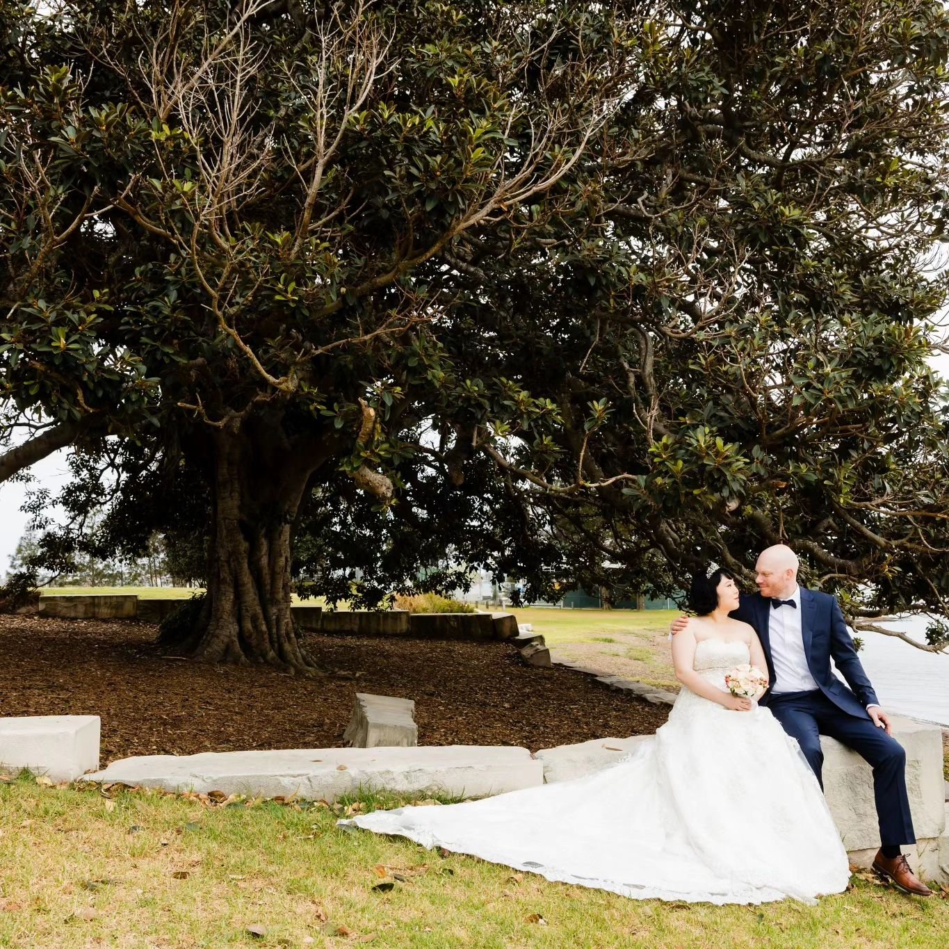 Cam &amp; Joo 😍❤️👇
Cam &amp; Joo held hands and shared their I Do&rsquo;s at the stunning and picturesque Green Point Foreshore Reserve! 
Amongst the beautiful Lake Macquarie and my Favourite tree in the world- they were surrounded by their closest