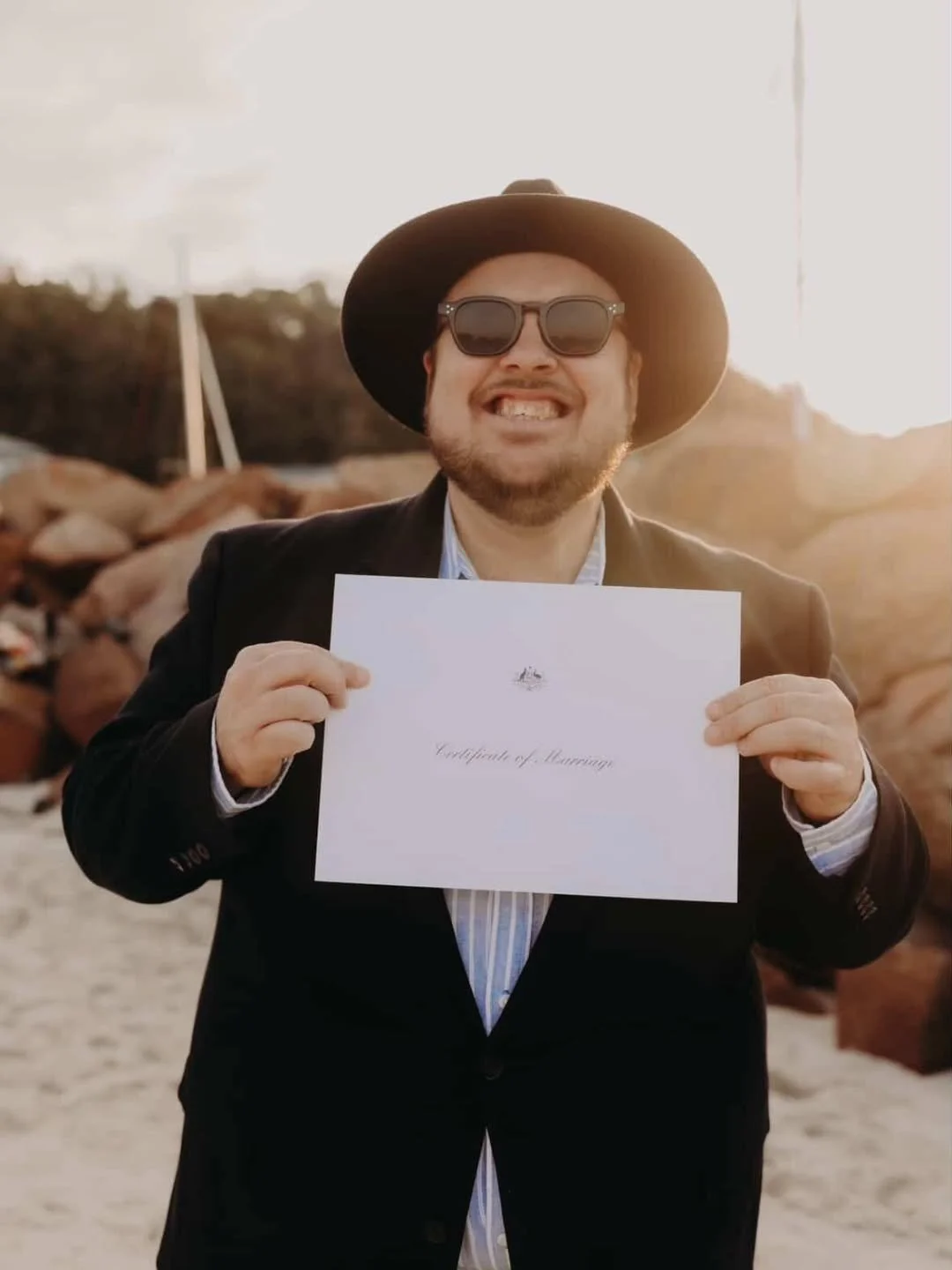 Sand in the shoes, sun on the face, and a couple of newlyweds officially hitched. Also, getting to work with an absolute legend Kaitlyn! 🫶 🩷 📷@photography_wildrose i couldn&rsquo;t love this gig more.