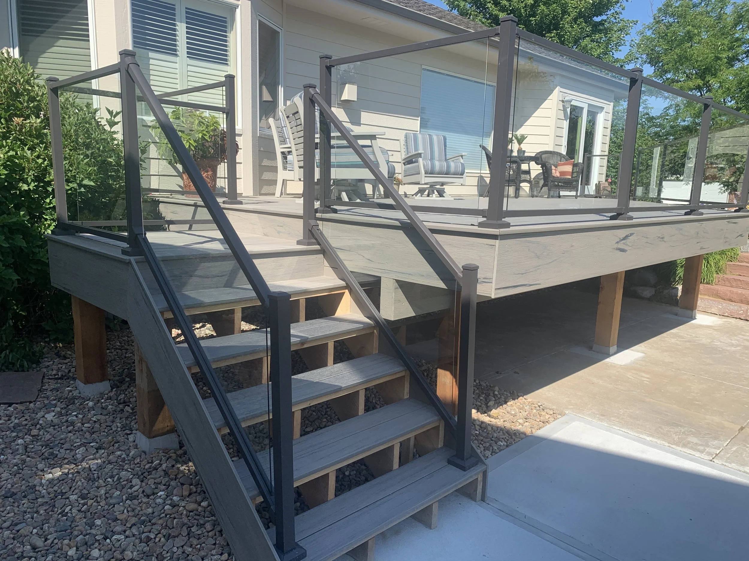 High end custom glass railing. Deer Creek Omaha