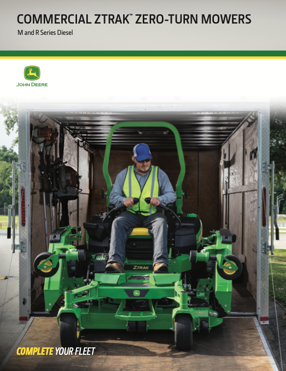 An operator driving a John Deere Z998R ZTrak Zero-Turn Mower down a trailer ramp.