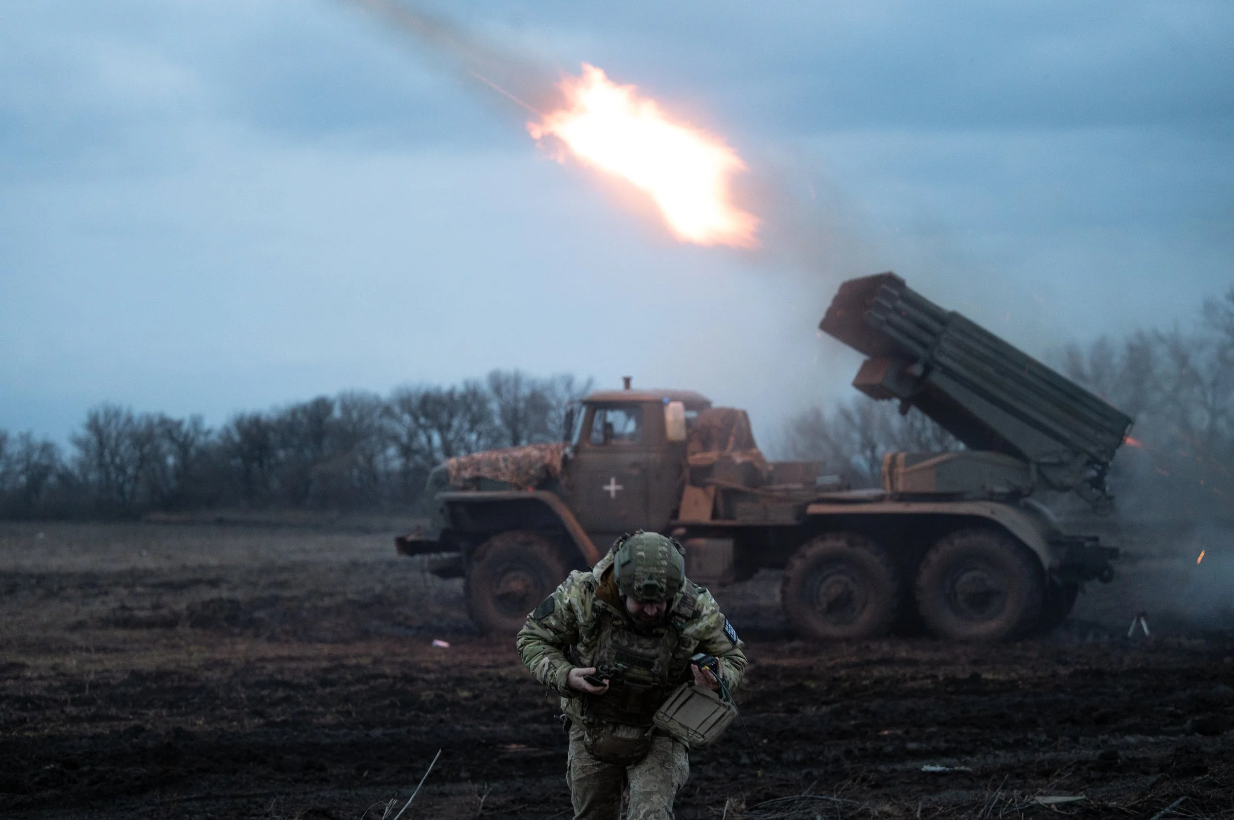 Ukraine soldier reacting to firing a missile on the frontline in Ukraine
