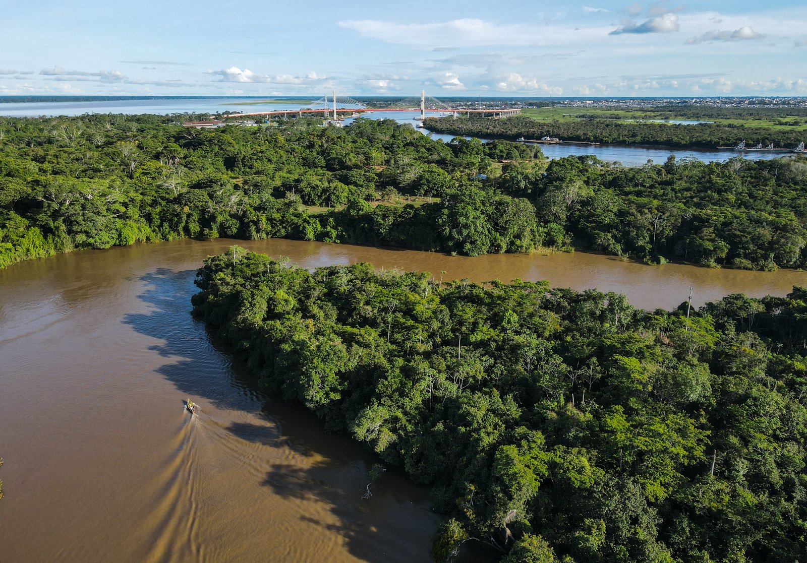 Boats are the main mode of transportation throughout the endless waterways, tributaries, floodplains, rivers and wetlands. On land, small motorcycle powered carts called tuk-tuks are the transport of choice. Here, a lancha returns down the Rio Momón