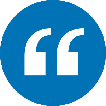 Blue circle with white quotation marks.