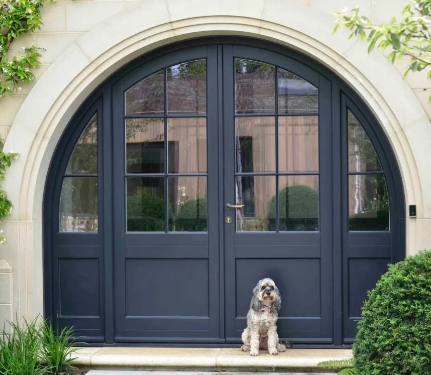 When the entrance makes a statement before you even step inside. This breathtaking arched French door is the definition of kerb appeal. Painted Farrow and Ball Railings with Samuel Heath Antique Brass ironmongery 👌

#TimberDoors #timberwindowsessex 