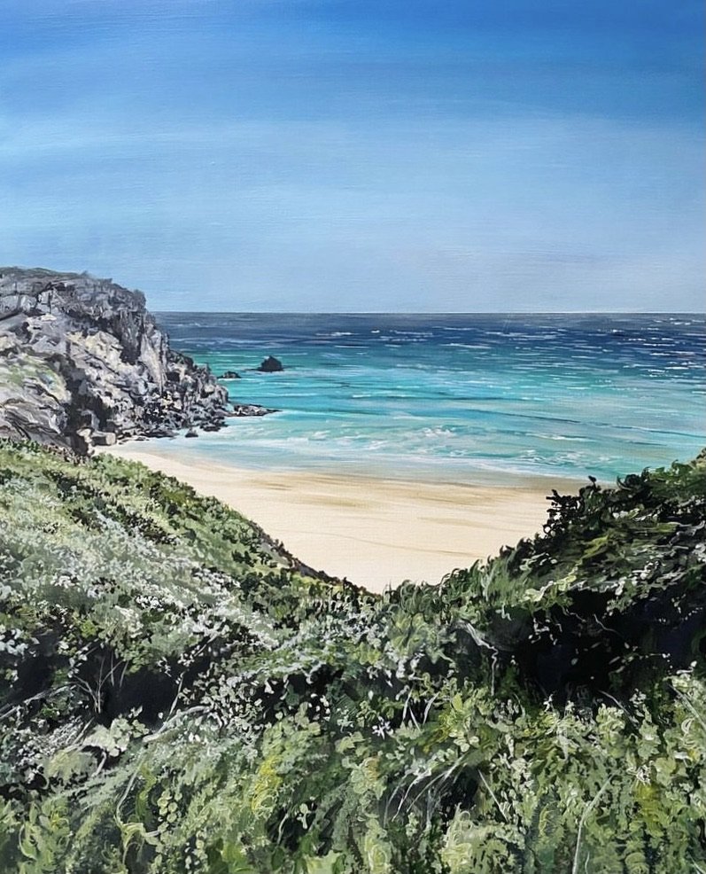 an acrylic painting of Porthchapel, the beach is in the background with shrubbery in the foreground, the ocean is turquoise and has a sparkle to it from the blue sunny sky