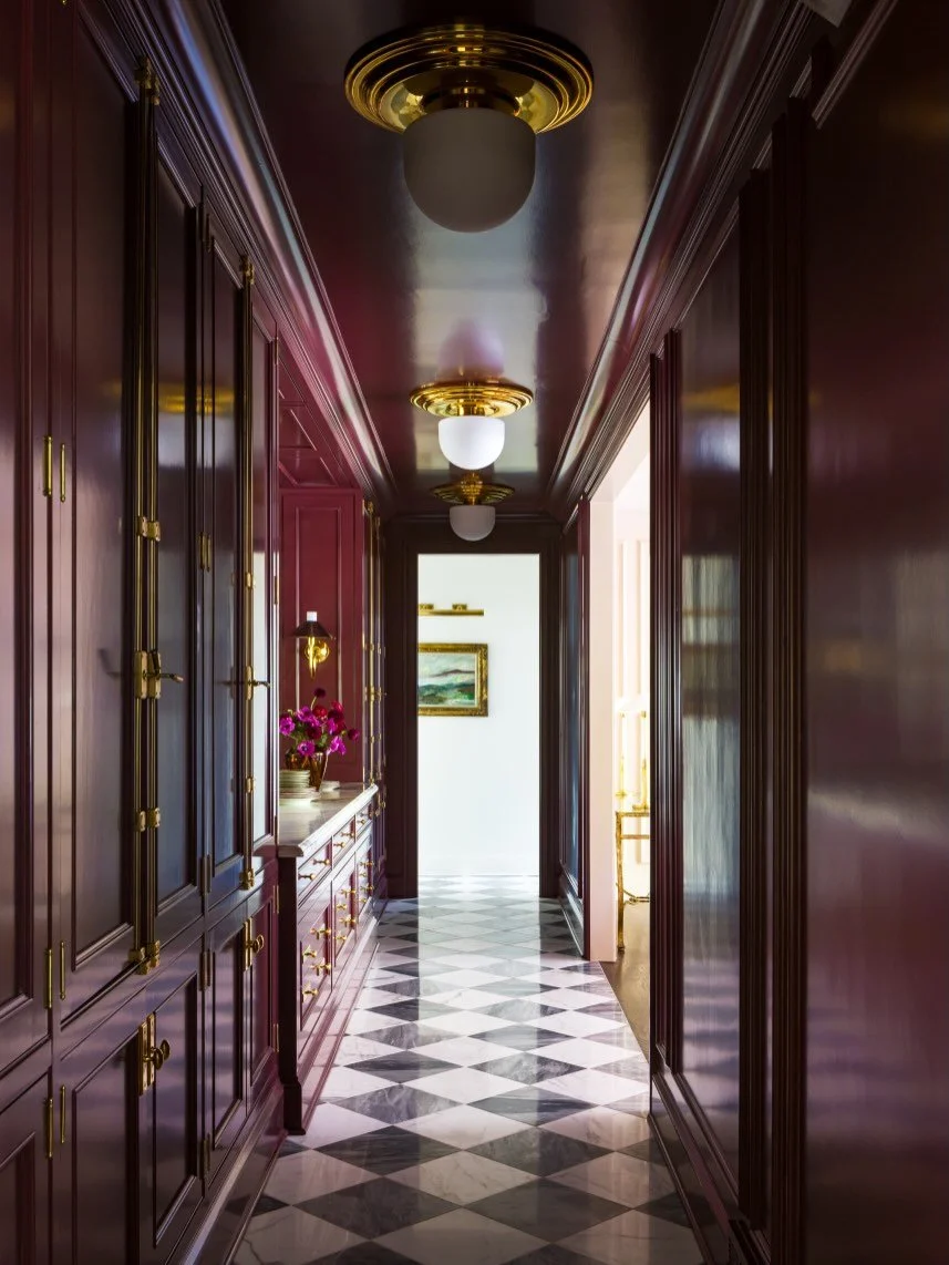 Welcome to the Hostess Hall. Capitalizing on the home&rsquo;s elongated footprint, we reimagined a simple corridor as a jewel box of color&mdash;designed for storage and effortless hosting alike.

#projectgardenparty

Design: @kobelandco
Photography: