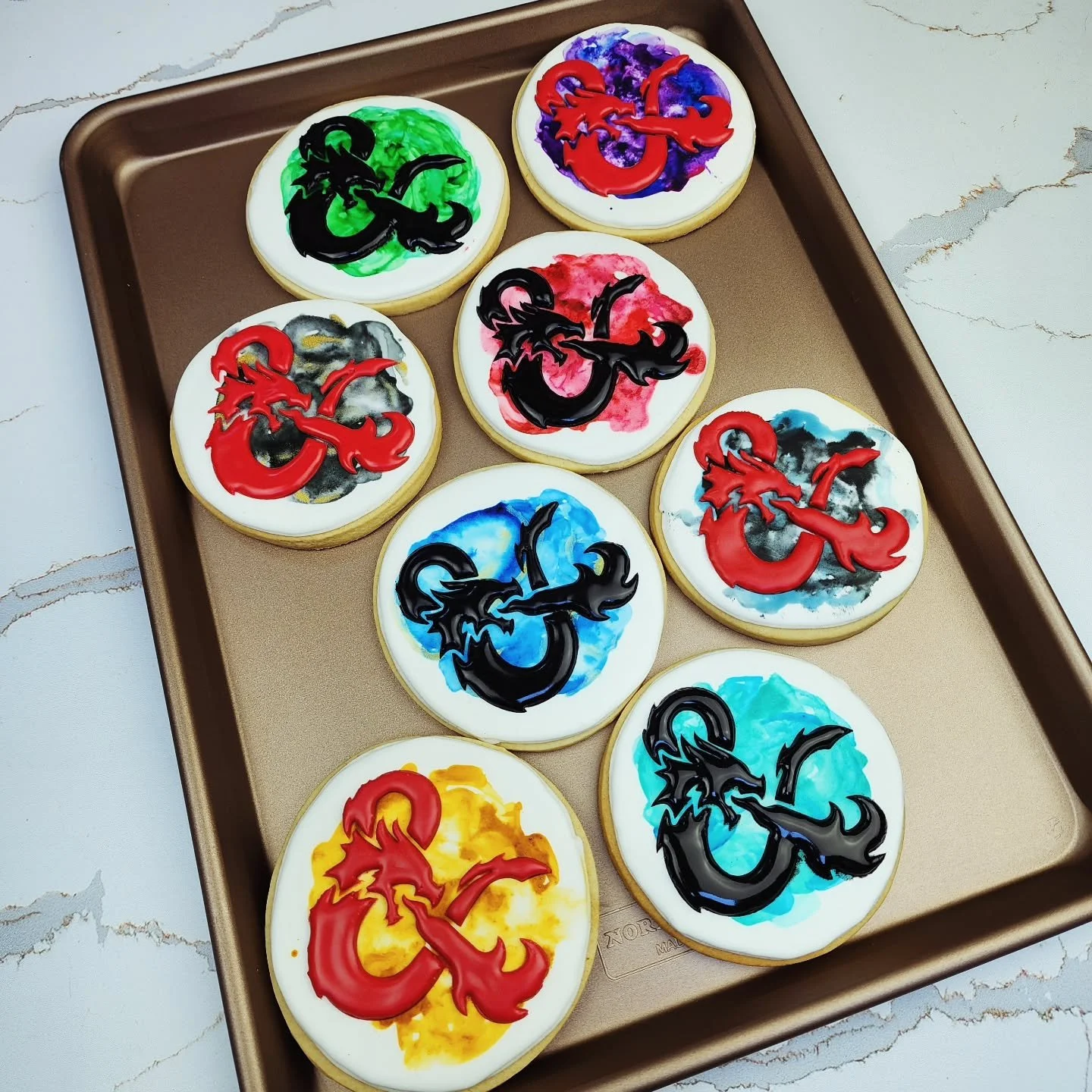 I just made 15 amazing Dungeons and Dragons cookies for my son's school group!  They have backgrounds that match the dice the teacher is giving out.  So proud of how these turned out &ndash; they&rsquo;re delicious and fun! 🍪 Hope they have fun with