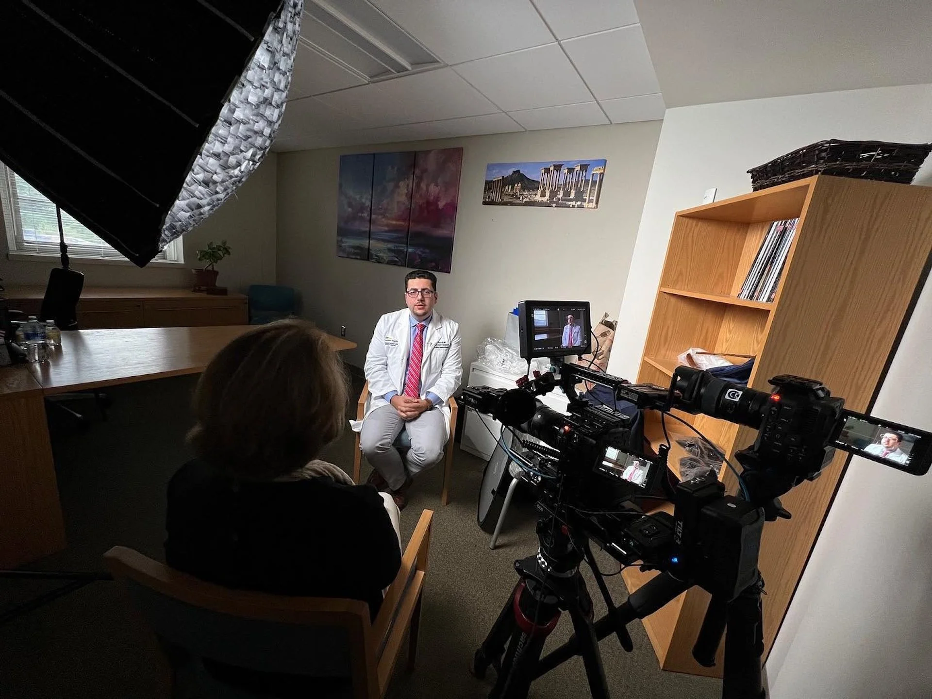 The C King Media video team filming a doctor at MedStar Georgetown University Hospital for a doctor story