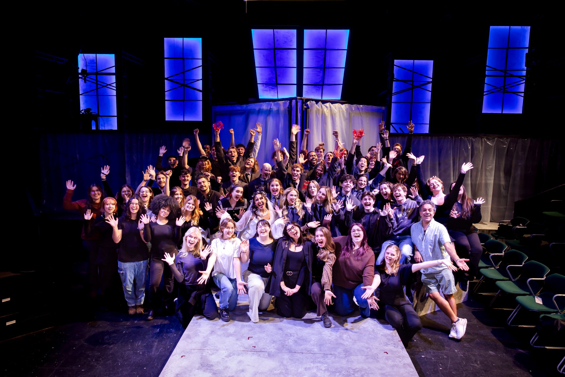 Full cast and crew of American Psycho posing together in the Glaize Studio Theatre at Shenandoah Conservatory