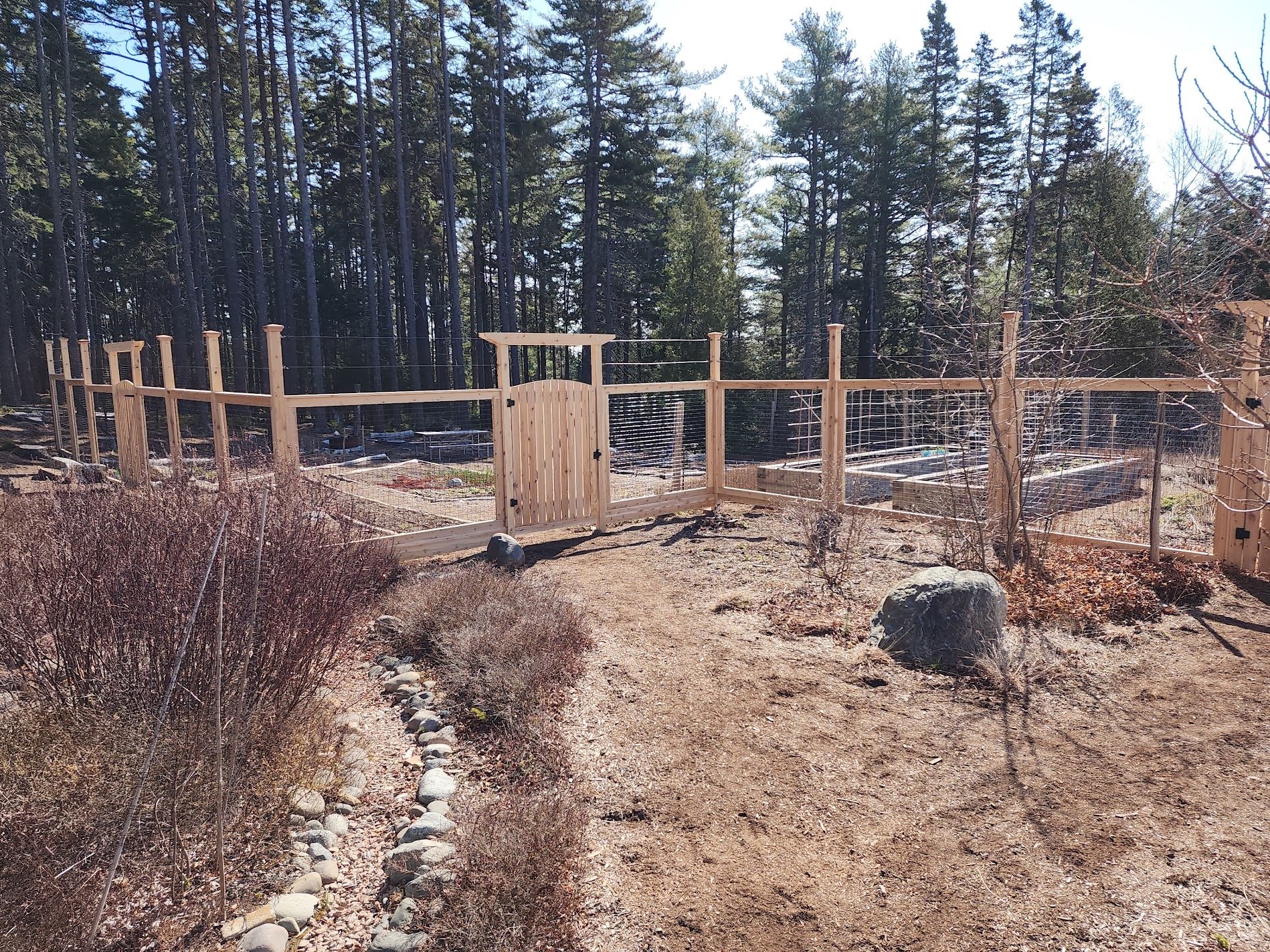 elongated wired posts provide additional deer protection for this garden enclosure (WW28)