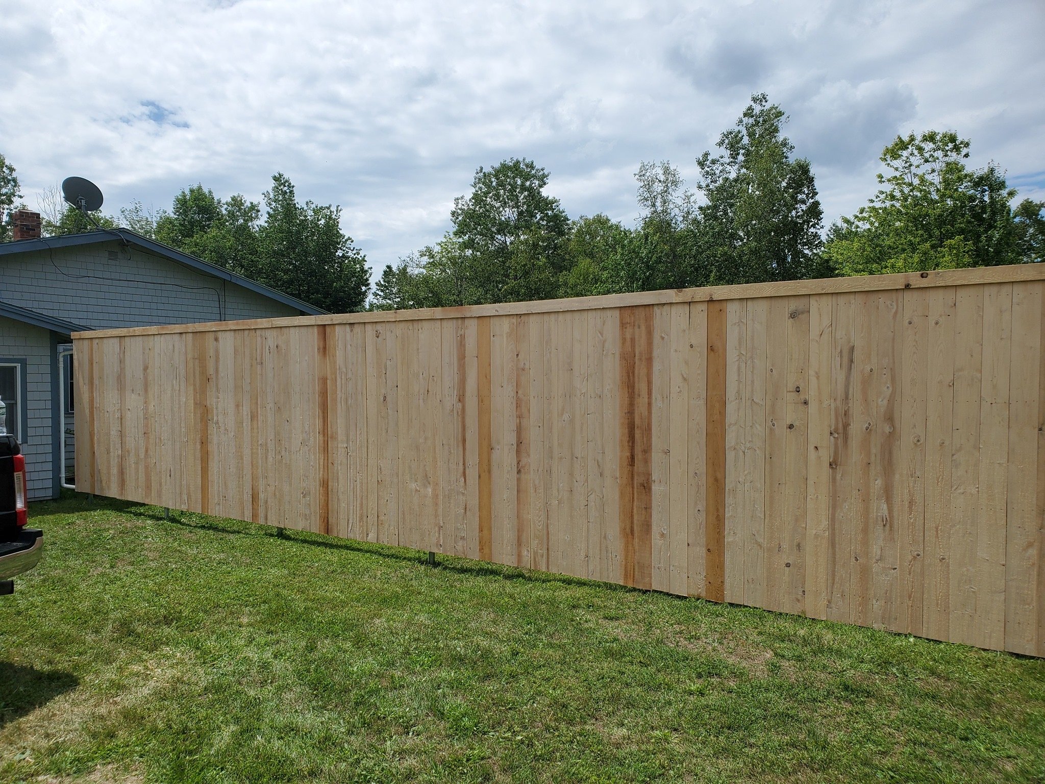 8' tall flat top cedar privacy on exposed steel posts (C31)