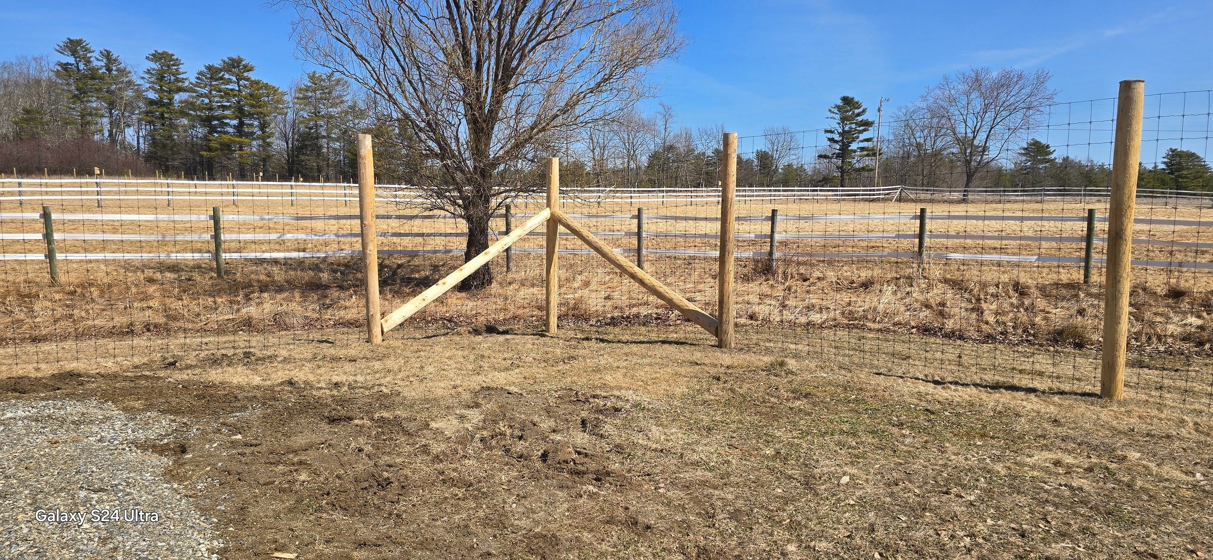 8' black steel deer fence on natural cedar posts (DF5)