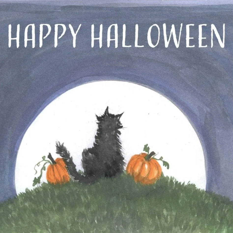 A Halloween greeting card with a silhouette of a black cat sitting on grass between two pumpkins, viewed against a large full moon. The top of the card says 'HAPPY HALLOWEEN' in white letters.