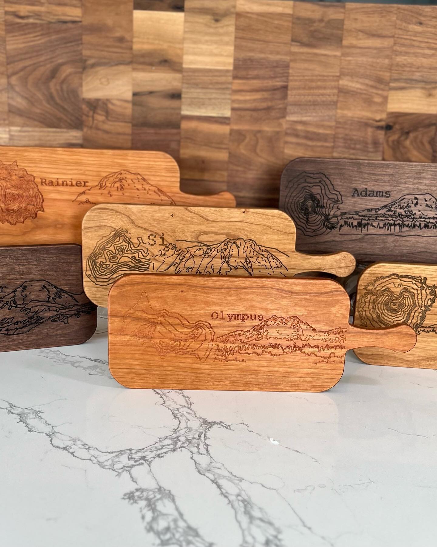 The mountains are out!  Come check out our new charcuterie boards featuring 6 of our beautiful mountains we have here in Washington.  We are also excited to announce we have 3 stain options available for ALL our wood products now. Which one do you li