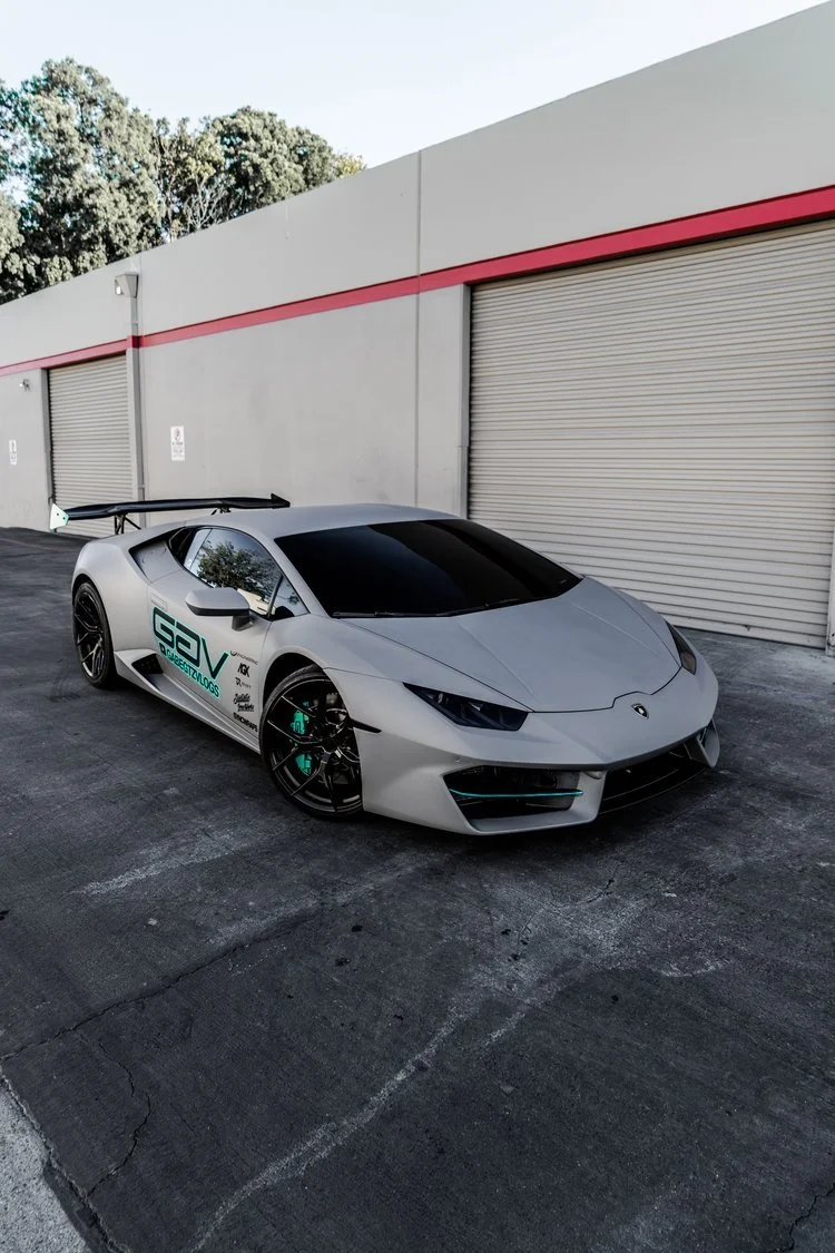 Car-wrap-PPF-vinyl-Custom-Logo-Print-ceramic-coated-Lamborghini-Huracan-vinyl-Wrapped-3m-Matte-Grey-painted-calipers-best-orange-county-syncwraps-4.jpg