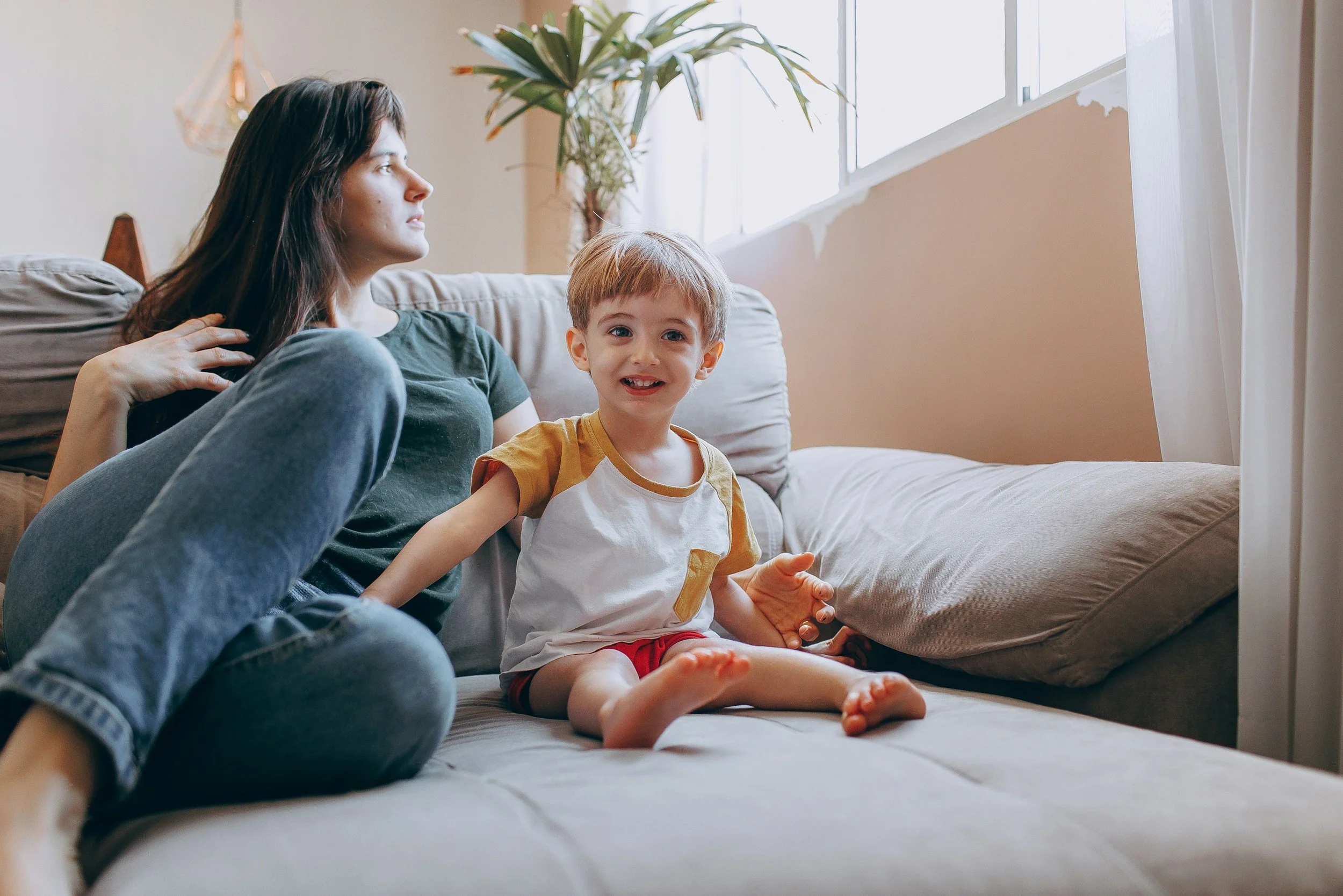 Parent and child sitting together, representing healing from intergenerational trauma