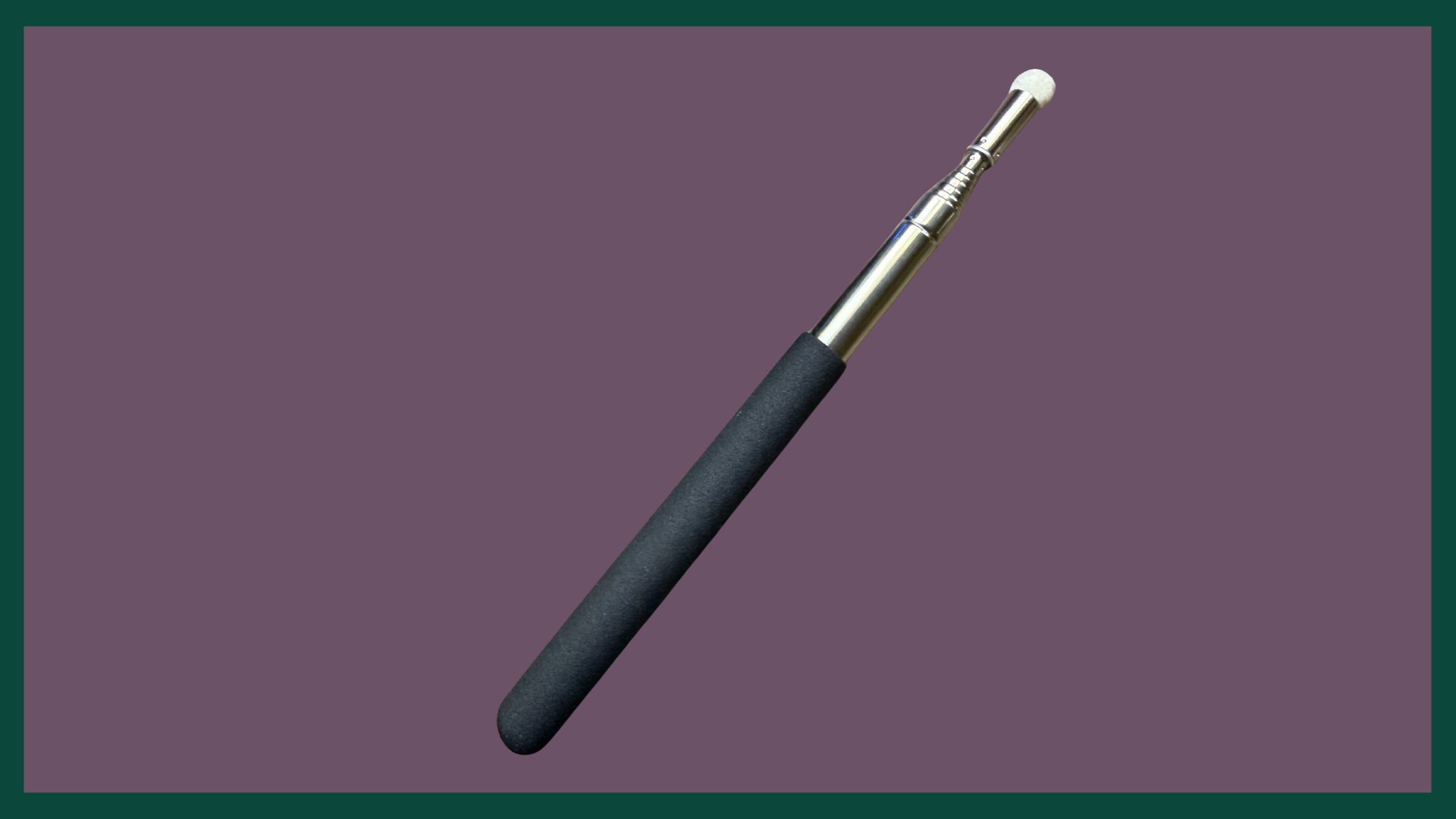 Image of Brainspotting pointer held by the therapist. The pointer is on a purple background, has a black handle, and round white tip.
